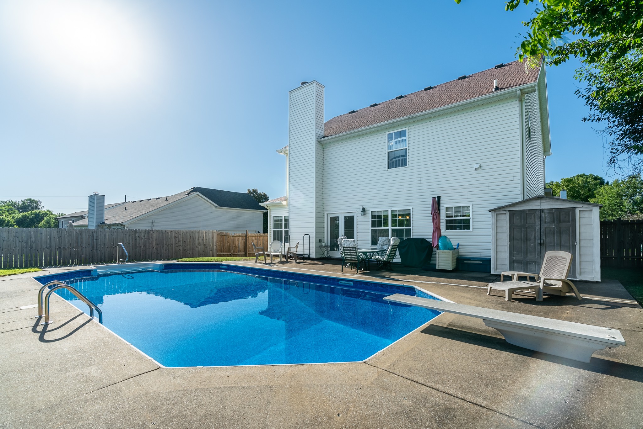 1707 Ginger Way Spring Hill, TN 37174 - Photo 2 of 39 a view of a swimming pool with a lounge chair