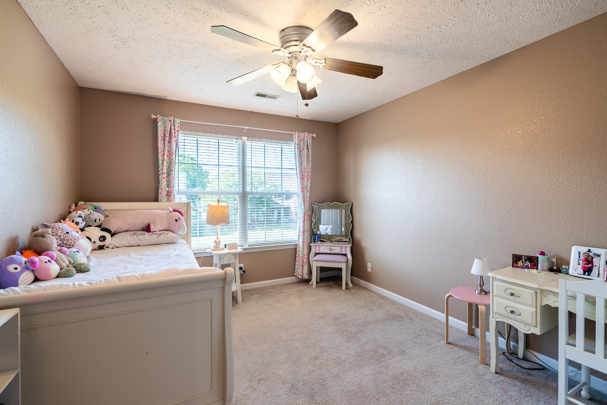 1707 Ginger Way Spring Hill, TN 37174 - Photo 28 of 39 a bedroom with furniture and a chandelier