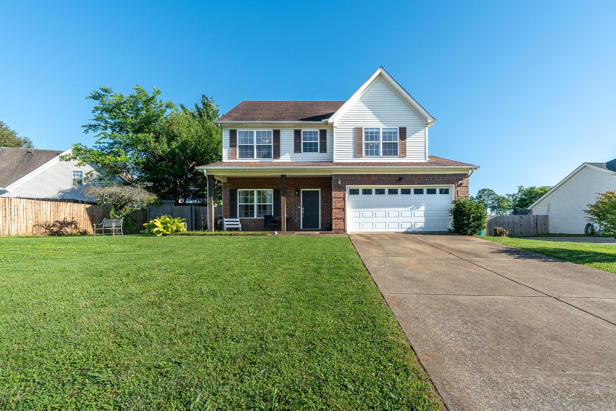 1707 Ginger Way Spring Hill, TN 37174 - Photo 31 of 39 a front view of a house with a yard and garage