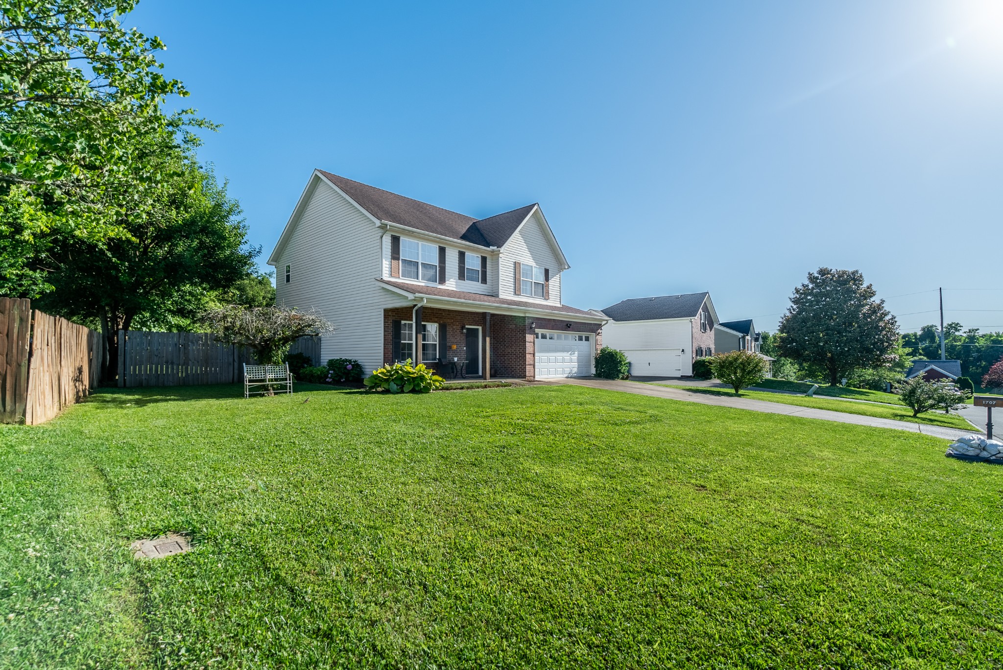 1707 Ginger Way Spring Hill, TN 37174 - Photo 32 of 39 a front view of a house with a yard and trees
