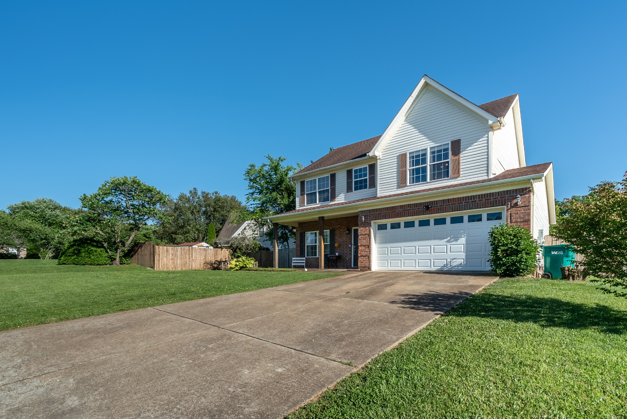 1707 Ginger Way Spring Hill, TN 37174 - Photo 33 of 39 a front view of a house with a yard and garage