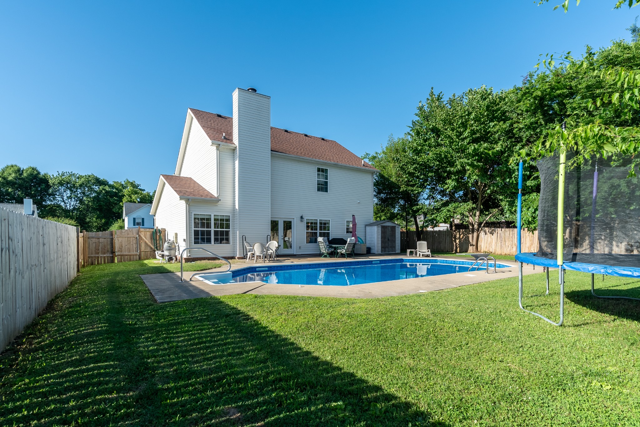 1707 Ginger Way Spring Hill, TN 37174 - Photo 35 of 39 a view of a house with swimming pool and a yard