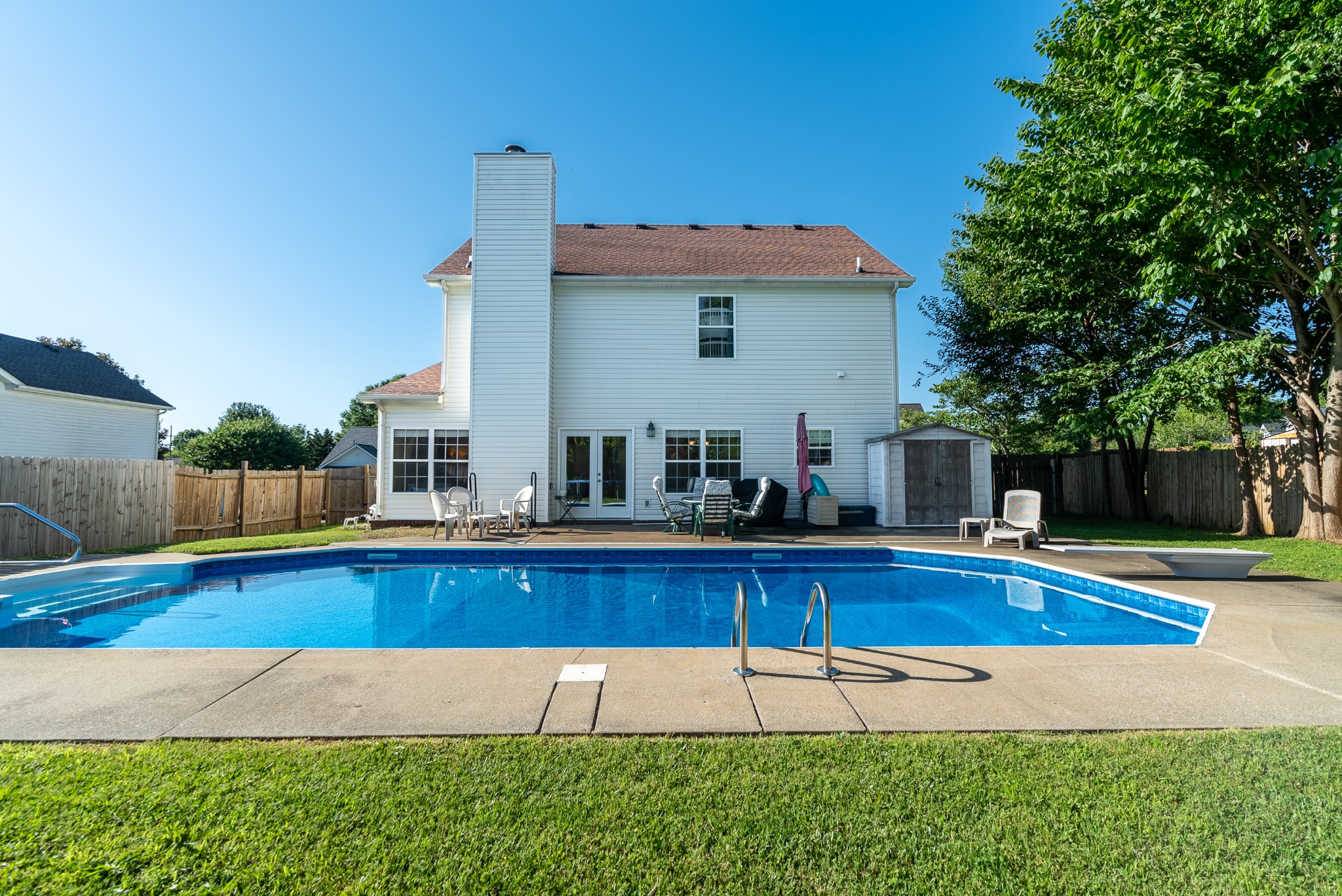 1707 Ginger Way Spring Hill, TN 37174 - Photo 36 of 39 a view of a house with pool and a yard