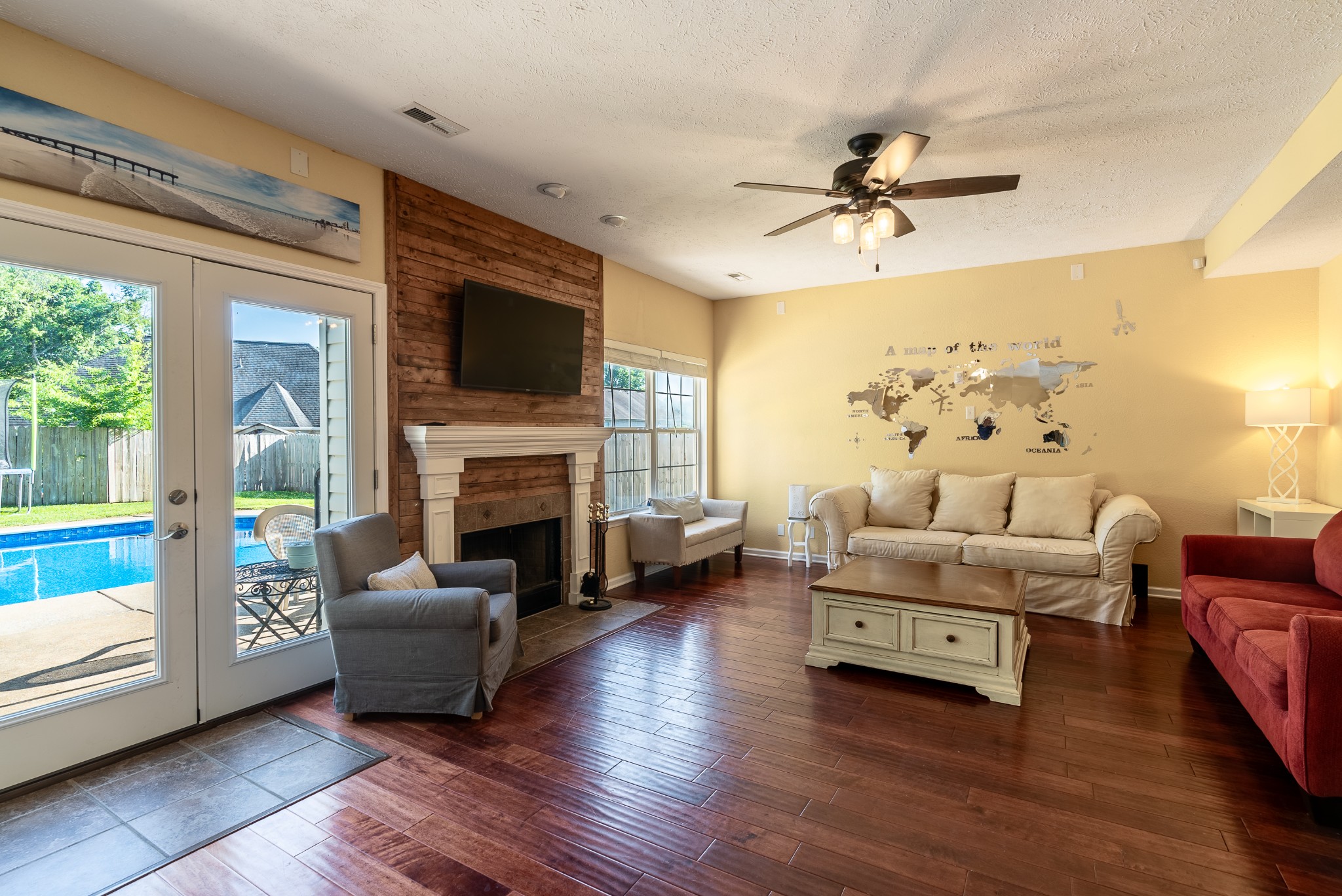 1707 Ginger Way Spring Hill, TN 37174 - Photo 8 of 39 a living room with furniture fireplace and flat screen tv