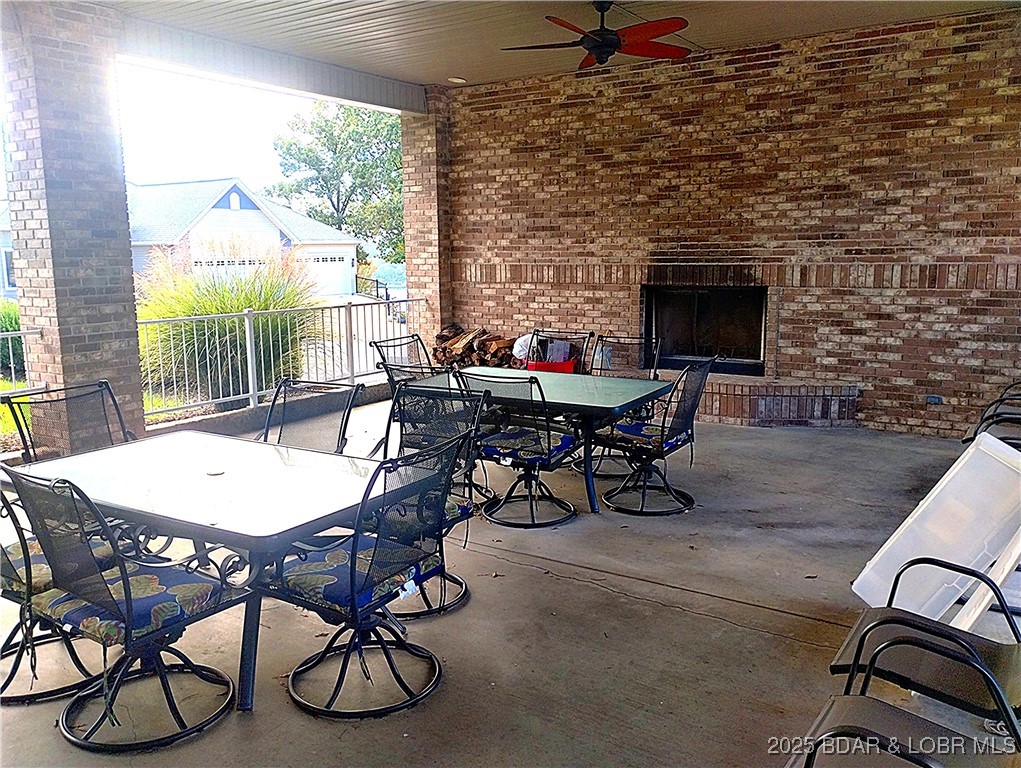 Lot 49 South Beacon Ridge Lake Ozark, MO 65049 - Photo 13 of 28 Covered patio with fireplace at the Clubhouse