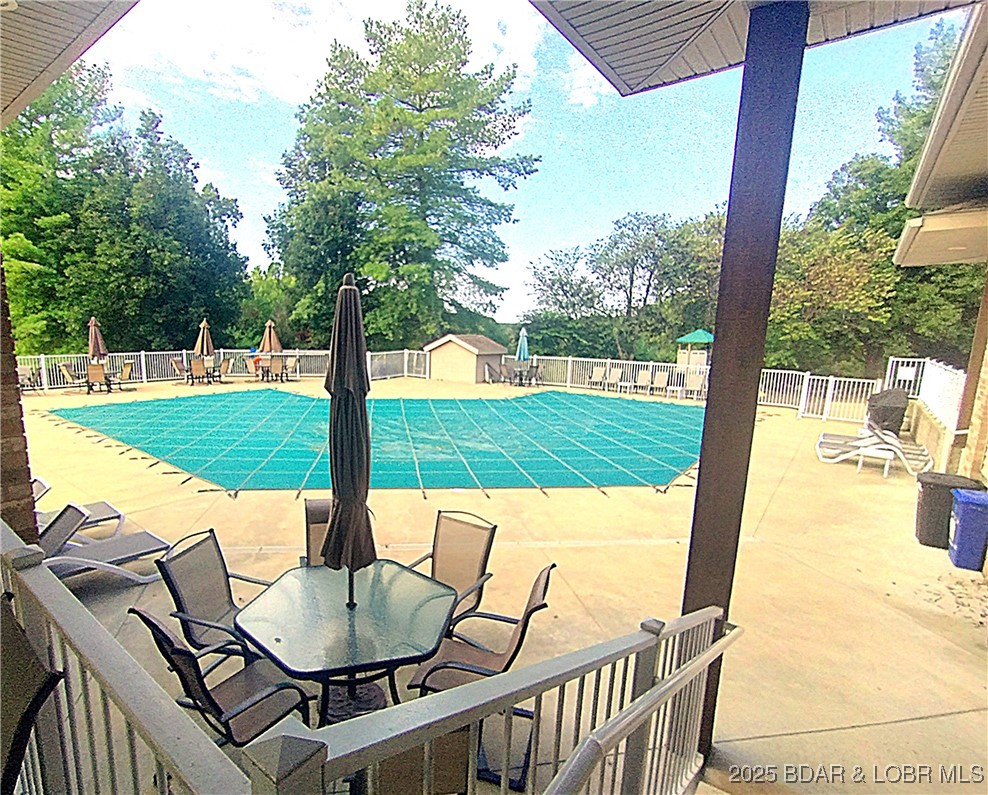 Lot 49 South Beacon Ridge Lake Ozark, MO 65049 - Photo 21 of 28 Pool view from covered patio