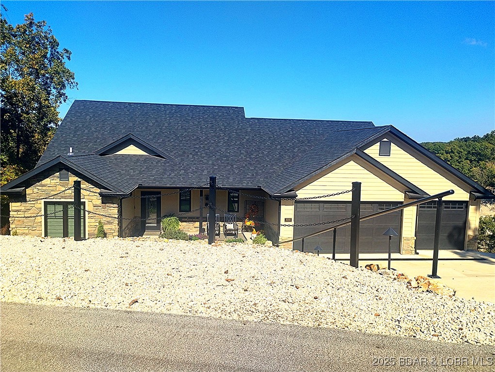 Lot 49 South Beacon Ridge Lake Ozark, MO 65049 - Photo 7 of 28 Home immediately right of subject site