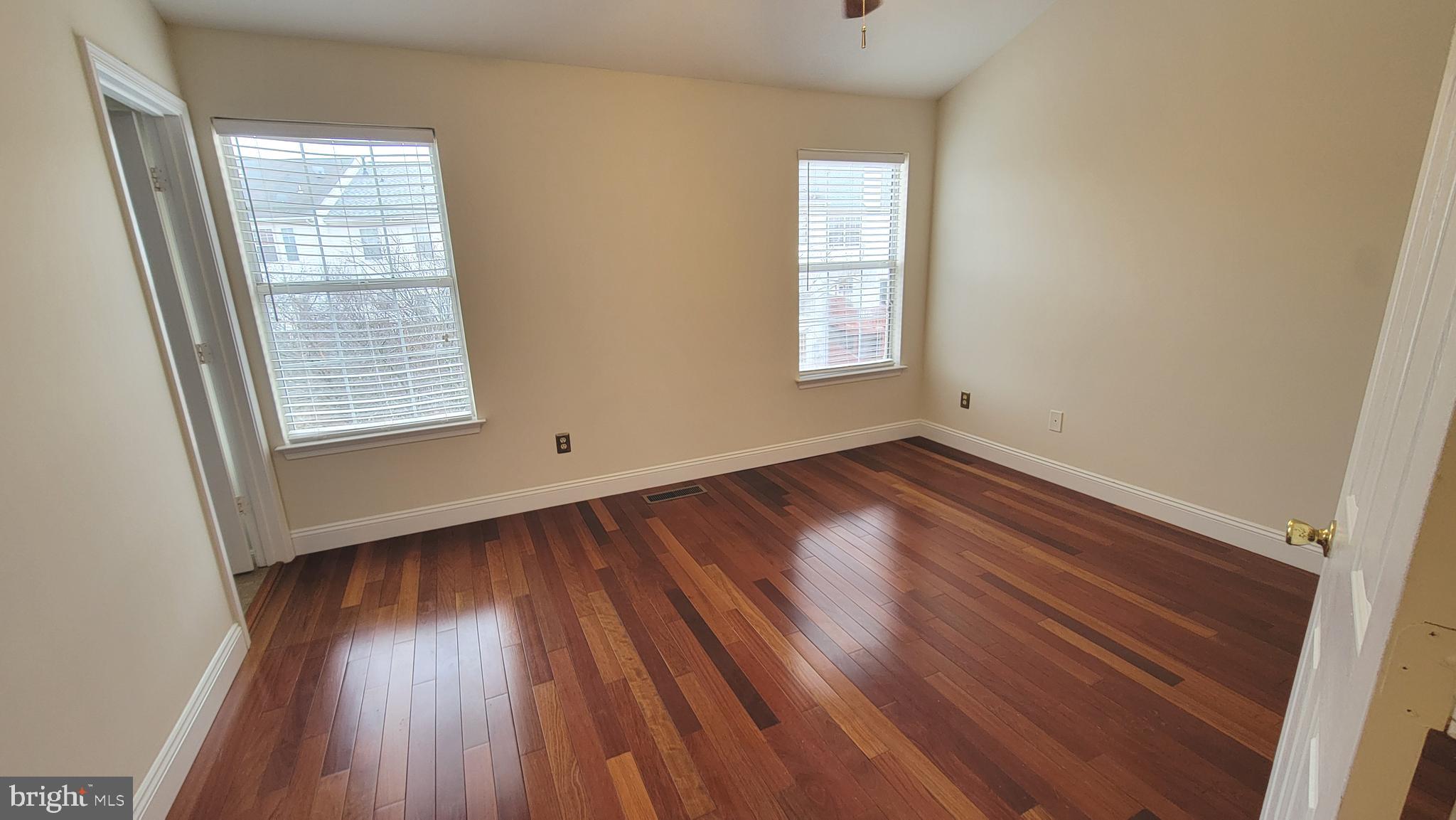 45495 Baggett Terrace Sterling, VA 20166 - Photo 16 of 24 Master Bededroom with beautiful hardwood floor