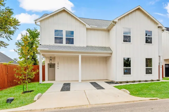 a view of outdoor space yard and front view of a house