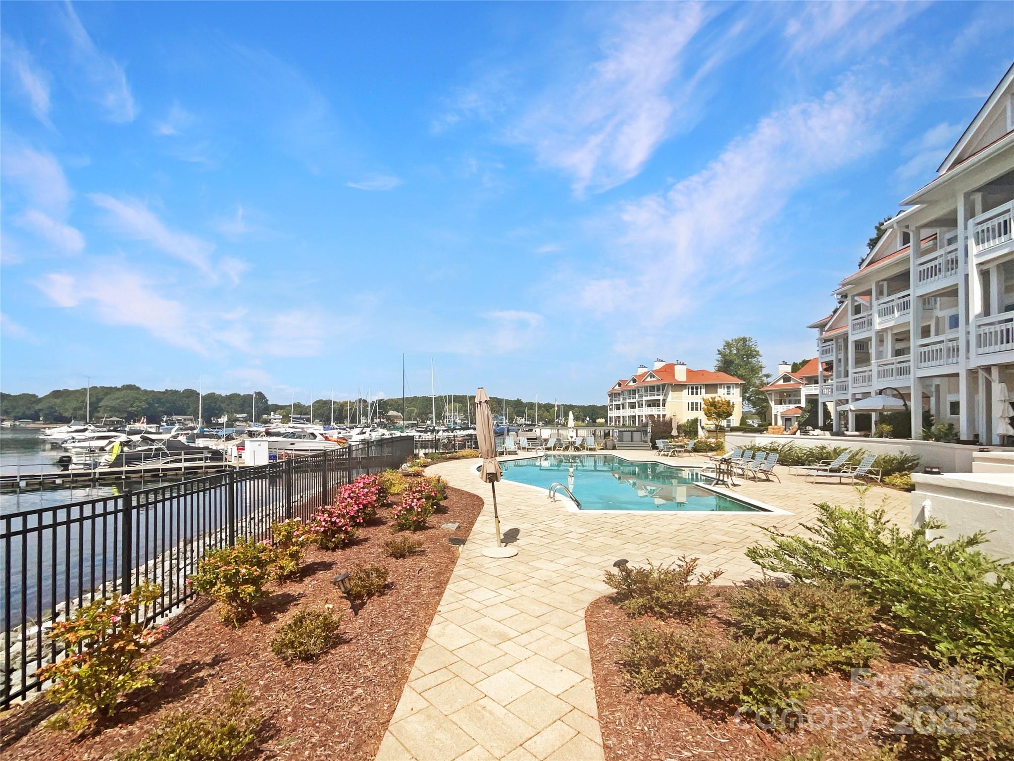 17931 Kings Point Drive, Unit G Cornelius, NC 28031 - Photo 19 of 20 a view of a city