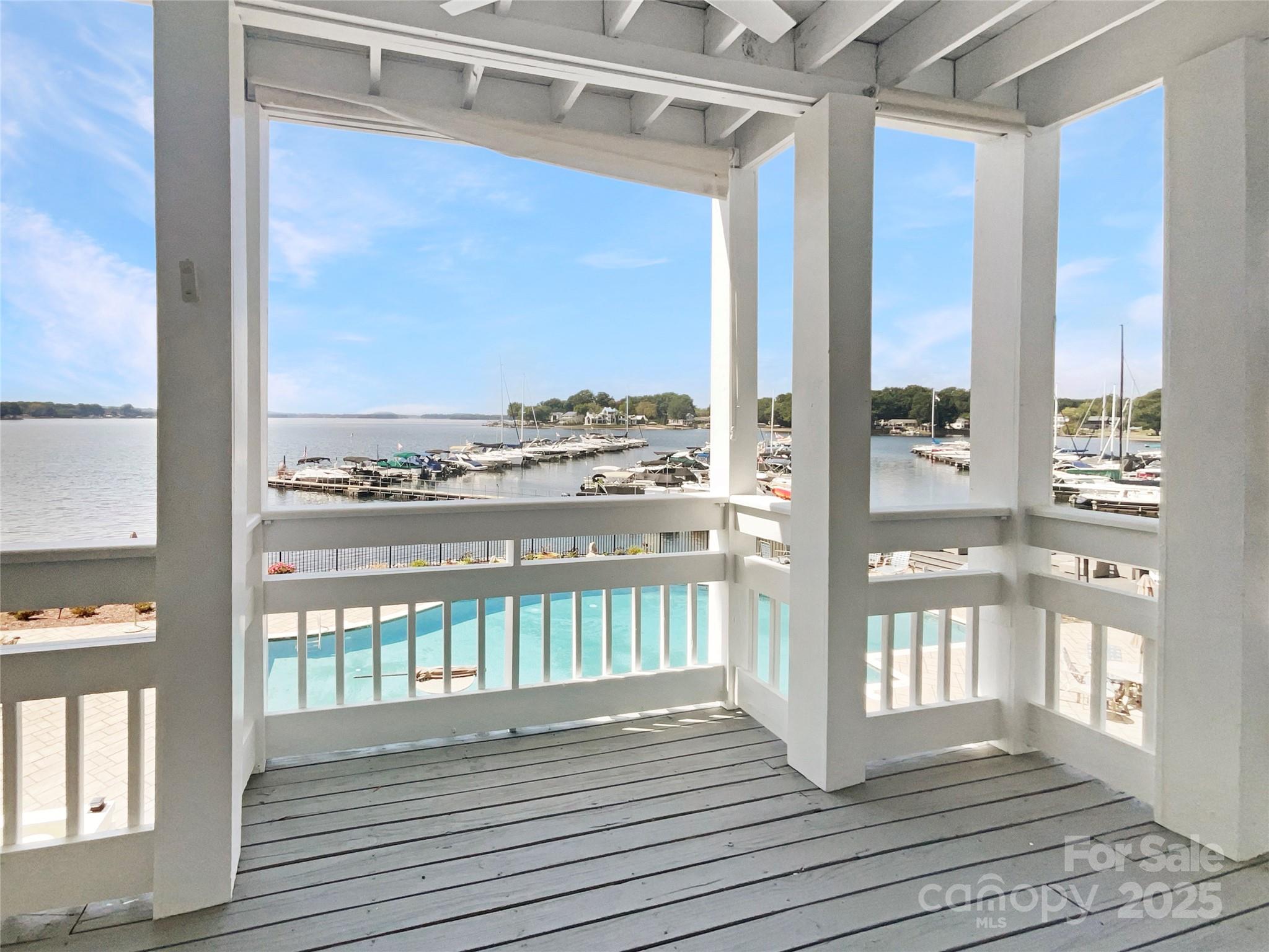 17931 Kings Point Drive, Unit G Cornelius, NC 28031 - Photo 5 of 20 a view of a balcony from door
