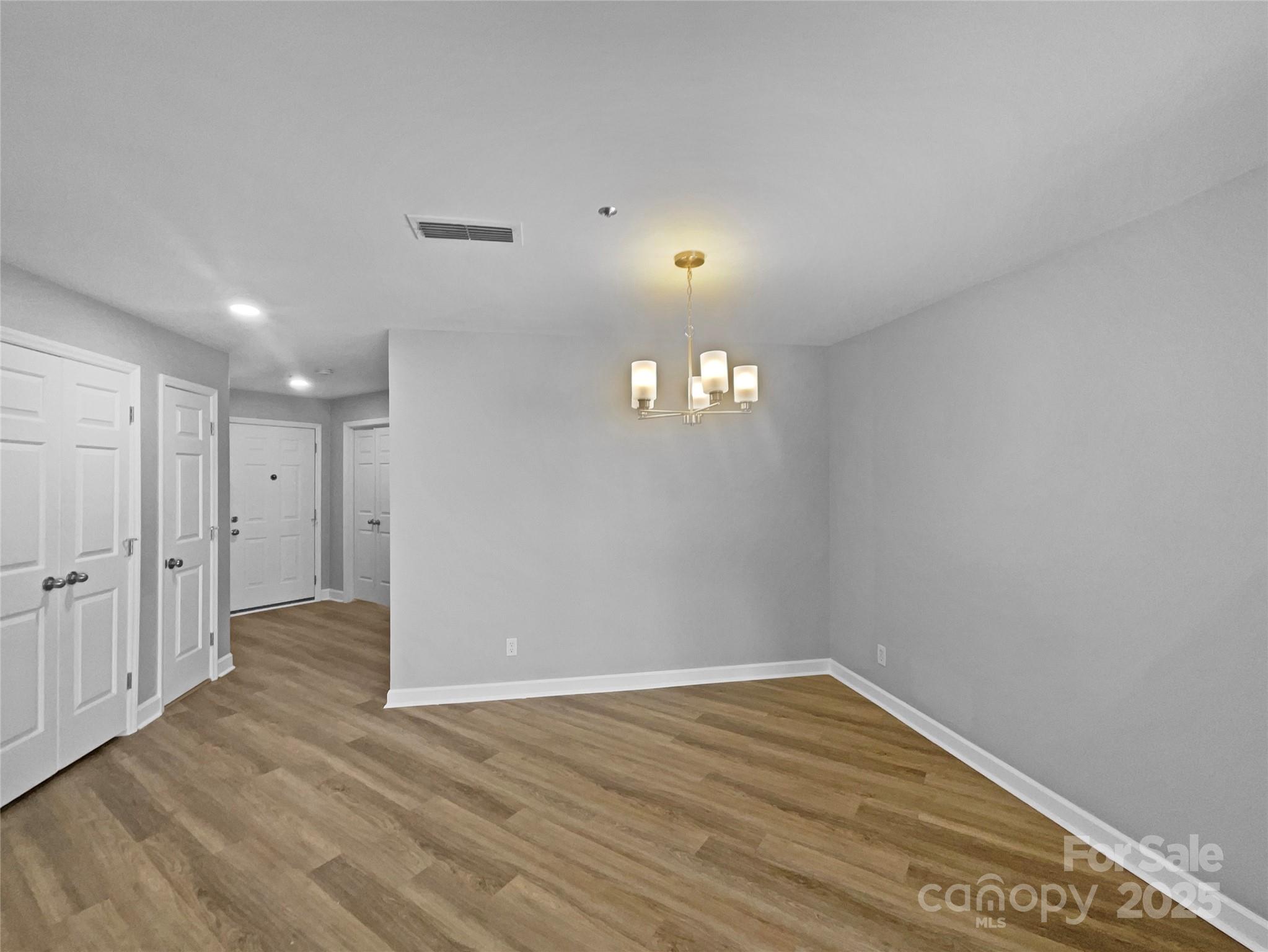 17931 Kings Point Drive, Unit G Cornelius, NC 28031 - Photo 7 of 20 a view of an empty room