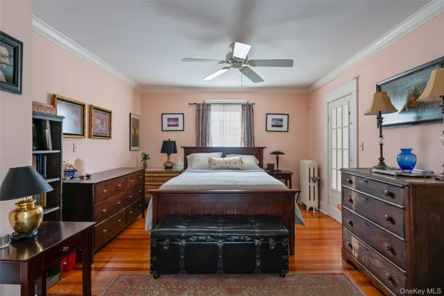a living room with furniture and flat screen tv