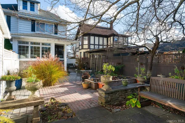 a view of the house with a patio