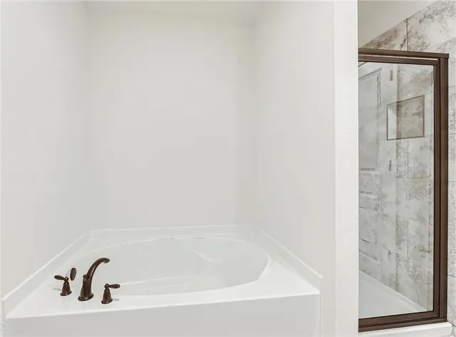 a bathroom with bathtub