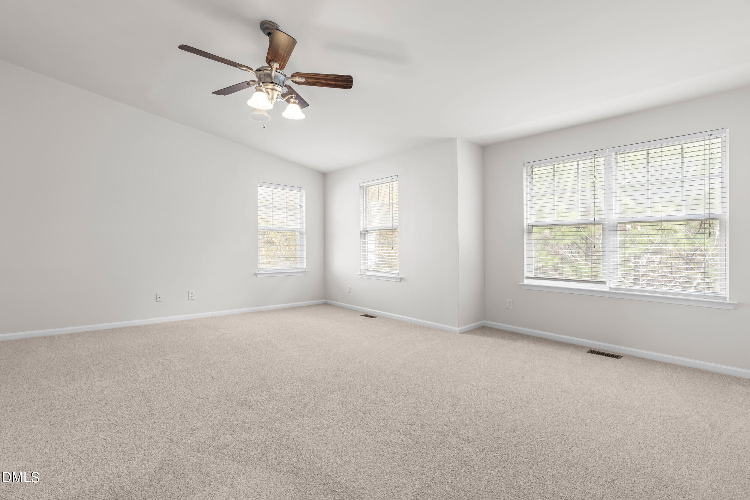 11710 Coppergate Drive, Unit 111 Raleigh, NC 27614 - Photo 10 of 31 a view of an empty room with a window