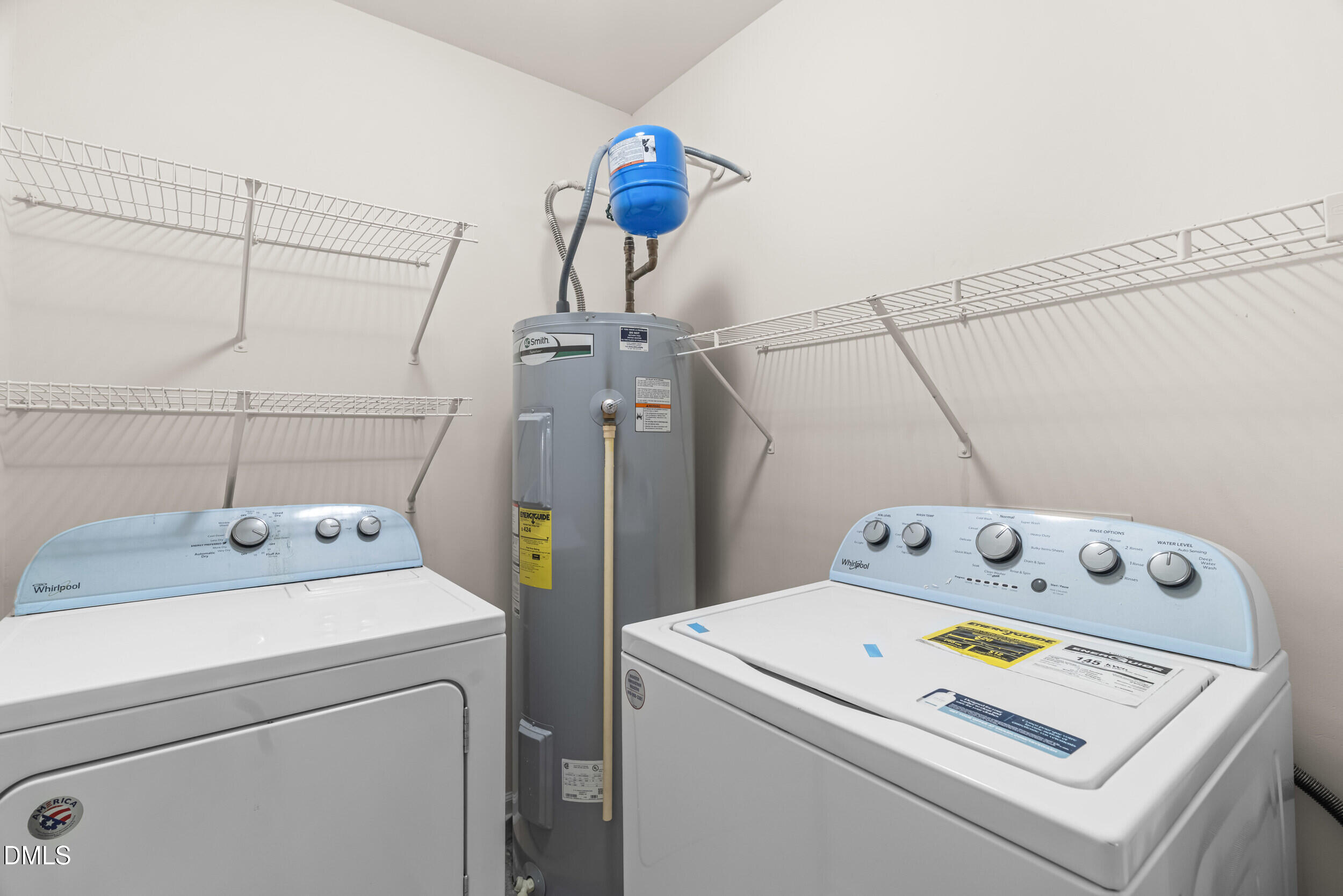 11710 Coppergate Drive, Unit 111 Raleigh, NC 27614 - Photo 20 of 31 a utility room with dryer and washer