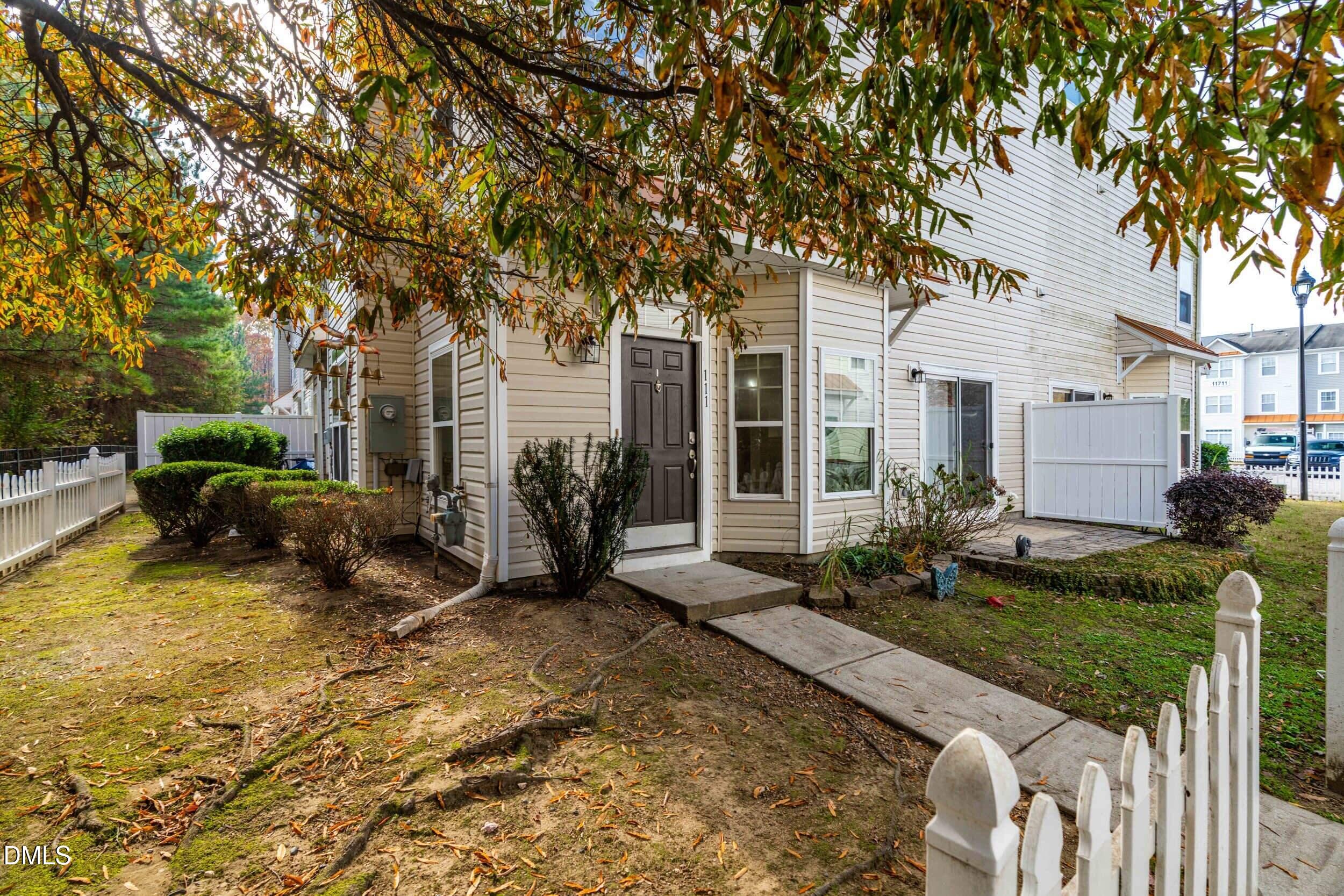 11710 Coppergate Drive, Unit 111 Raleigh, NC 27614 - Photo 22 of 31 a view of a house with backyard and sitting area