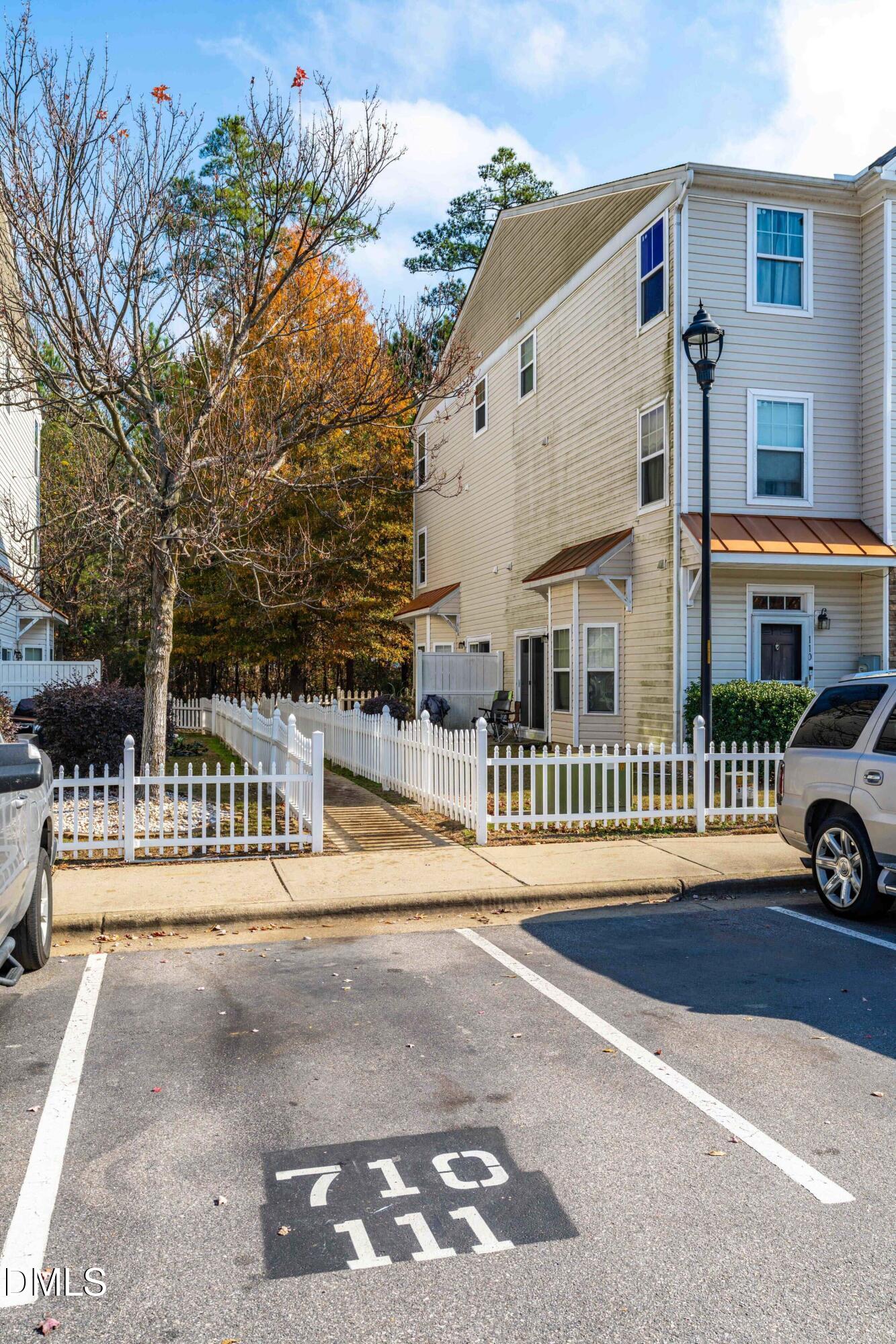 11710 Coppergate Drive, Unit 111 Raleigh, NC 27614 - Photo 25 of 31 a view of a building with car parked