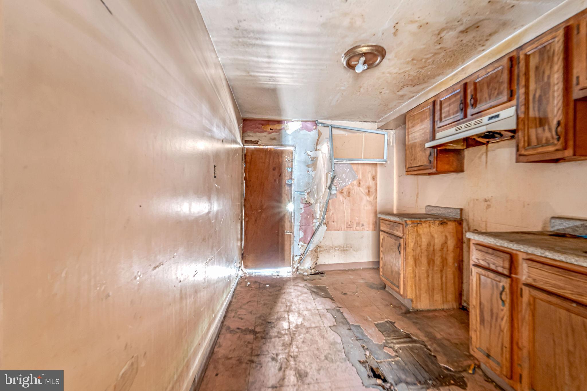 839 Spruce Street Camden, NJ 08103 - Photo 13 of 15 a view of a kitchen with a sink