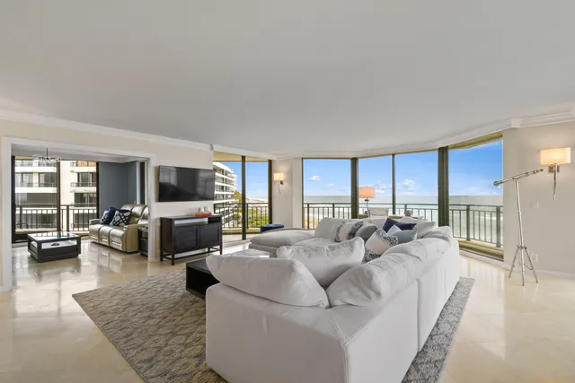a kitchen with a refrigerator and cabinets