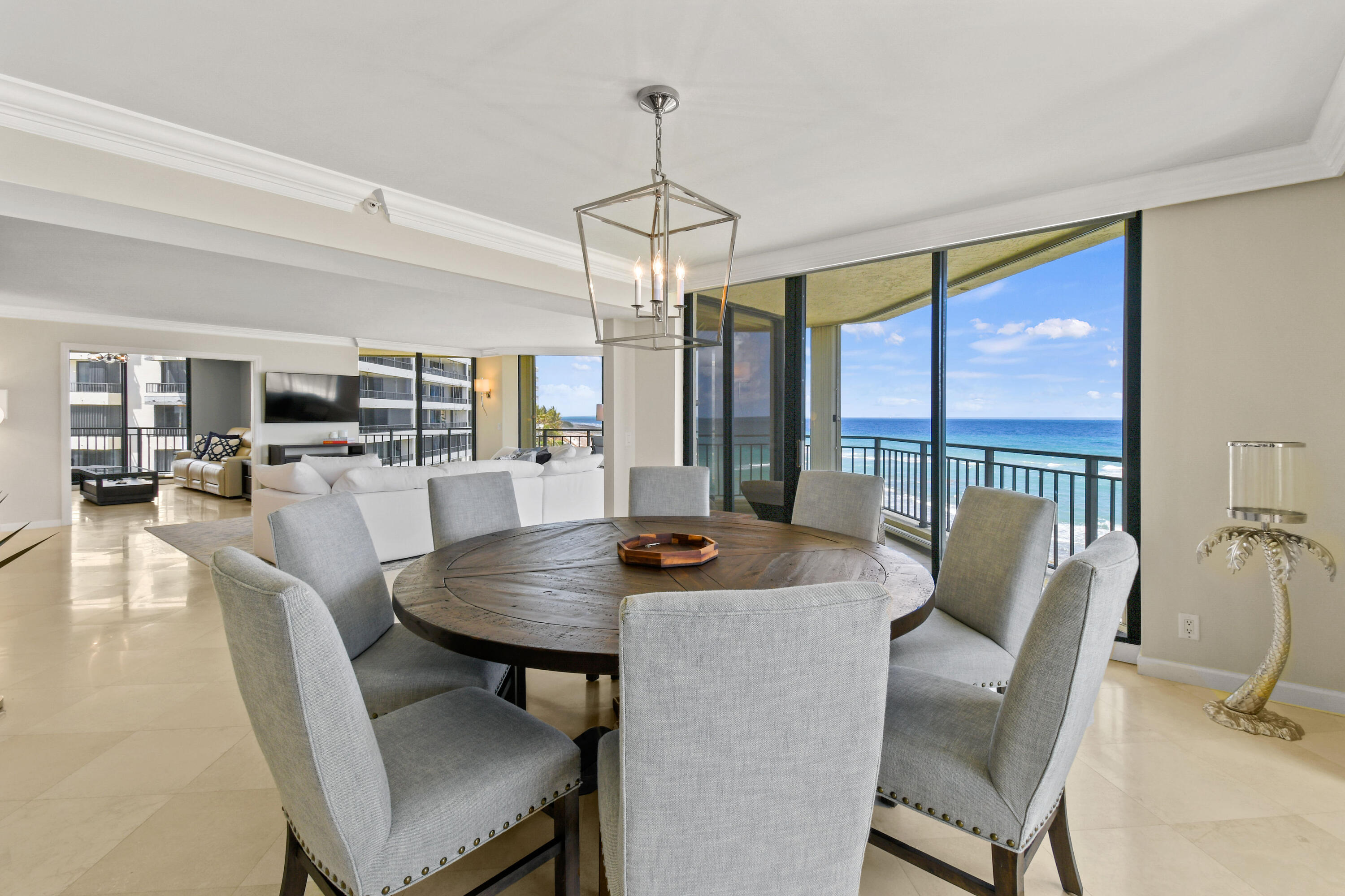 19850 South Beach Road, Unit 5A Jupiter, FL 33469 - Photo 25 of 78 a view of a dining room with furniture window and outside view