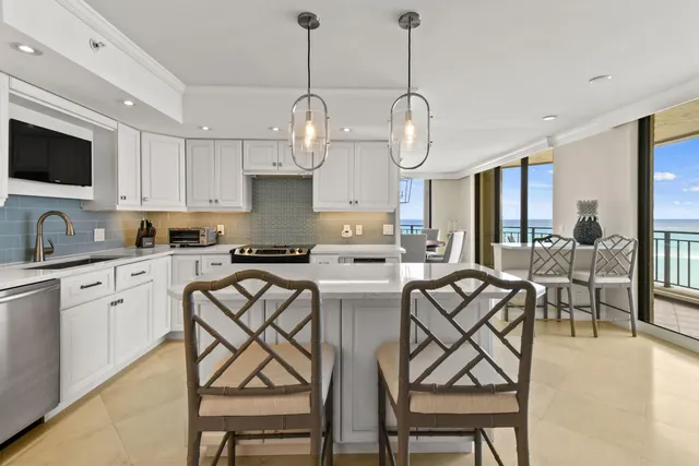 a bathroom with a shower sink and mirror