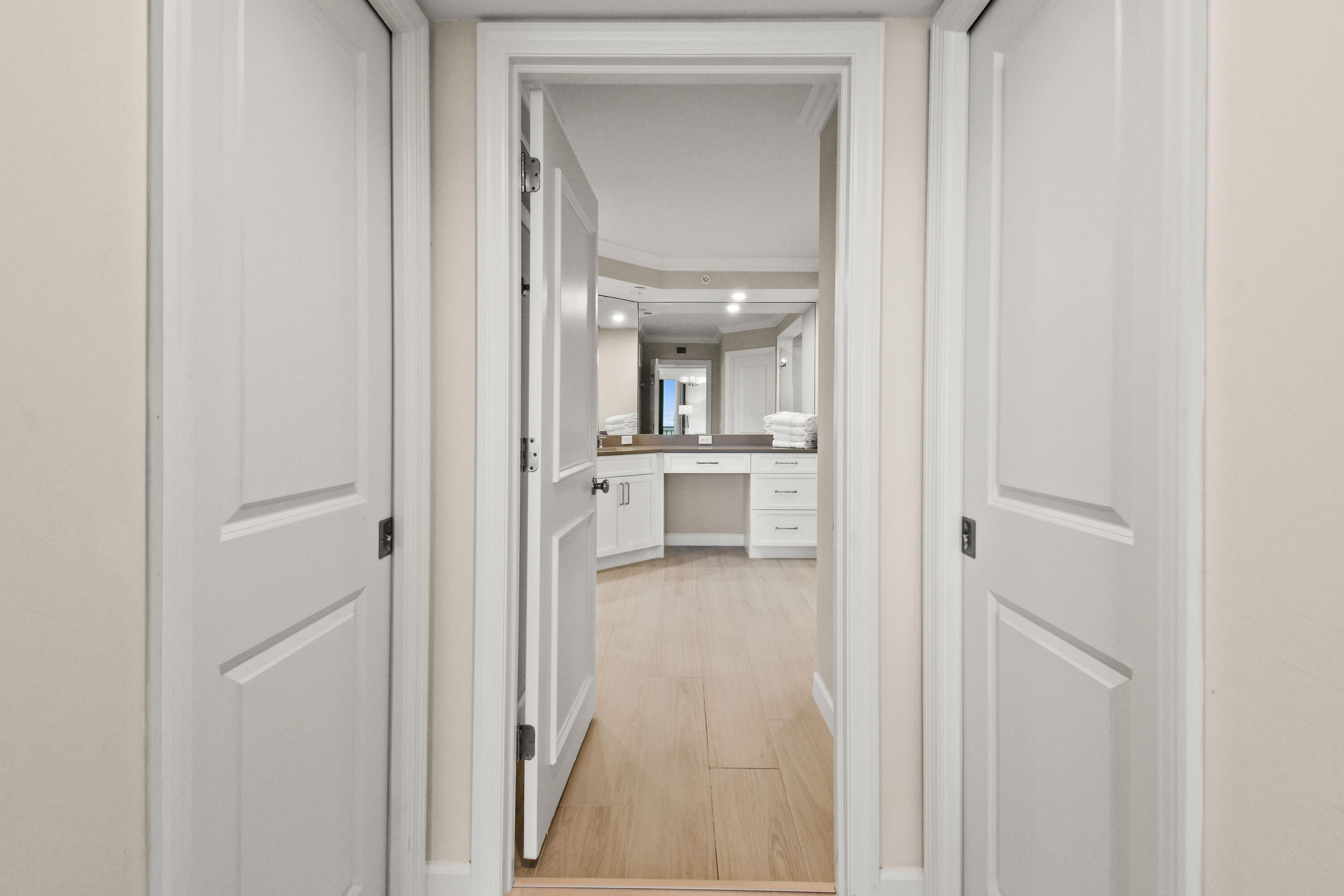 19850 South Beach Road, Unit 5A Jupiter, FL 33469 - Photo 39 of 78 a view of a bedroom from a hallway