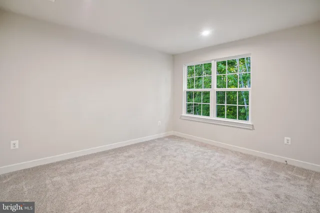 a bathroom with a double vanity sink toilet and shower