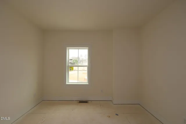 an empty room with a window