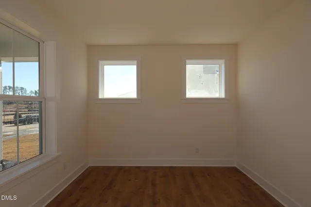 a view of hallway with a window