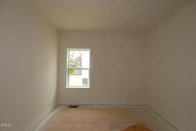 a view of a window in an empty room