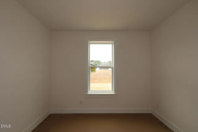 an empty room with a window