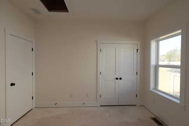 a view of an empty room with window