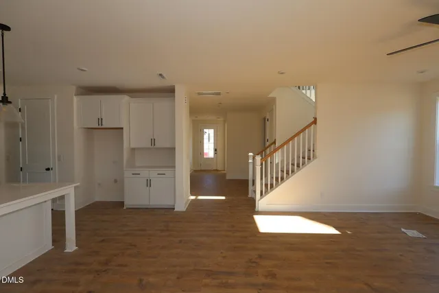 a view of room with hardwood floor