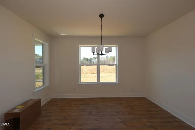 a view of entryway with kitchen