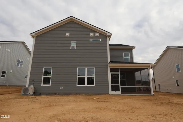 a front view of a house with a garage