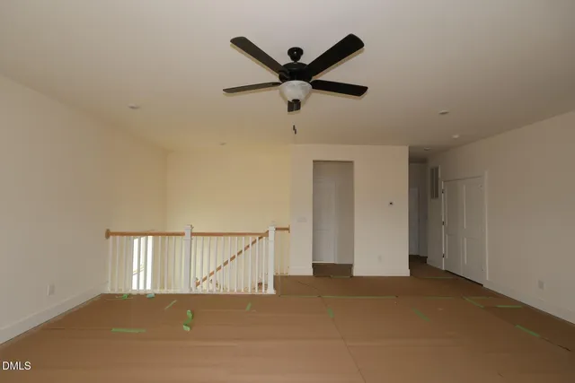 a view of a livingroom with a ceiling fan