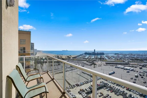 a view of a balcony with an ocean view