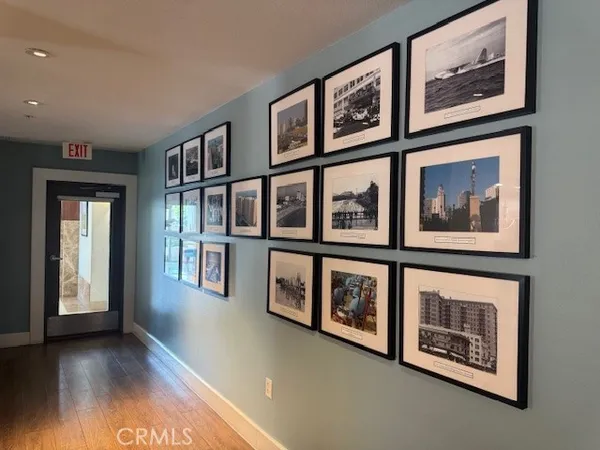 a view of an entryway with wooden floor