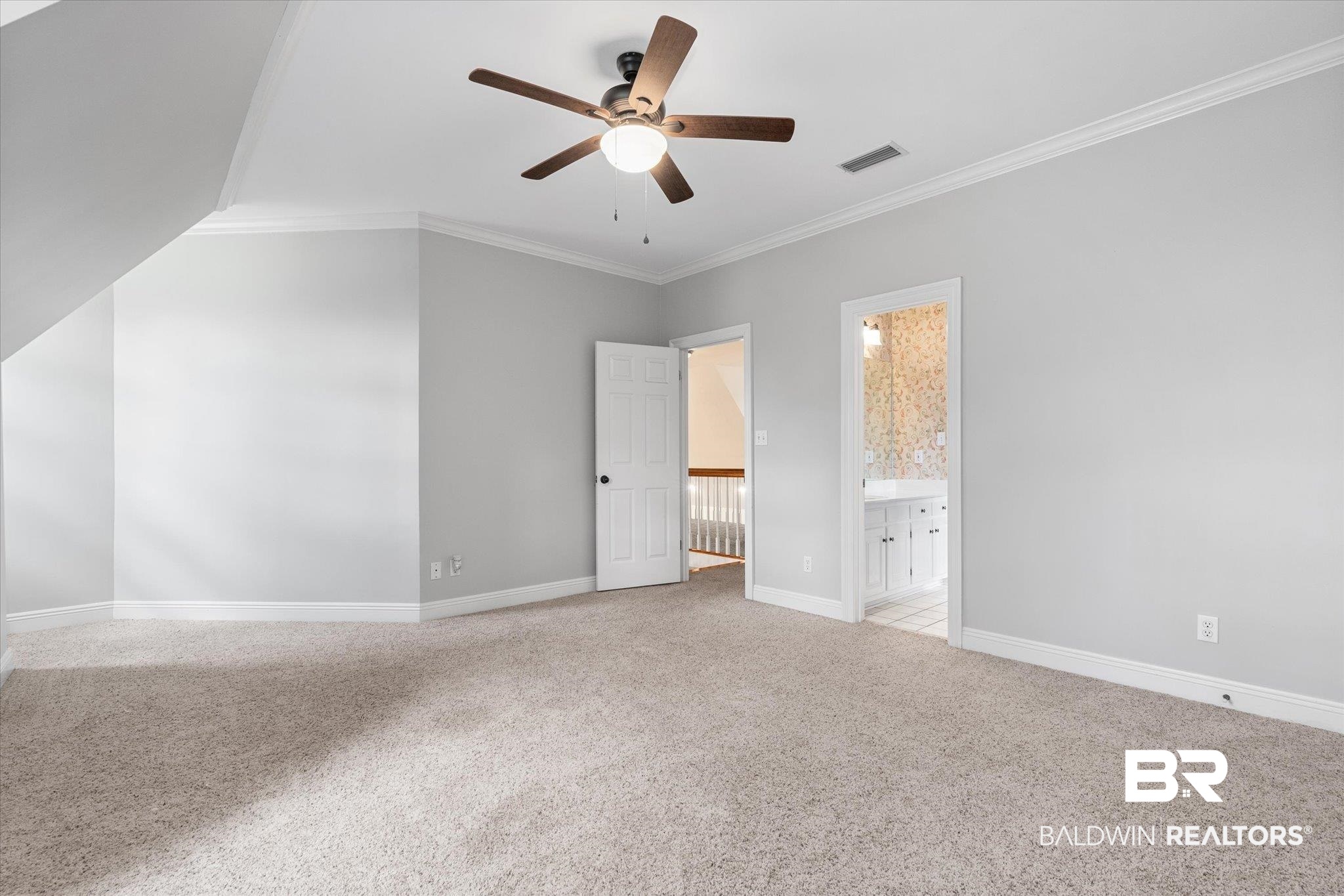 5231 Dawes Road Grand Bay, AL 36541 - Photo 19 of 49 Unfurnished bedroom with light carpet, ornamental molding, ensuite bath, and ceiling fan