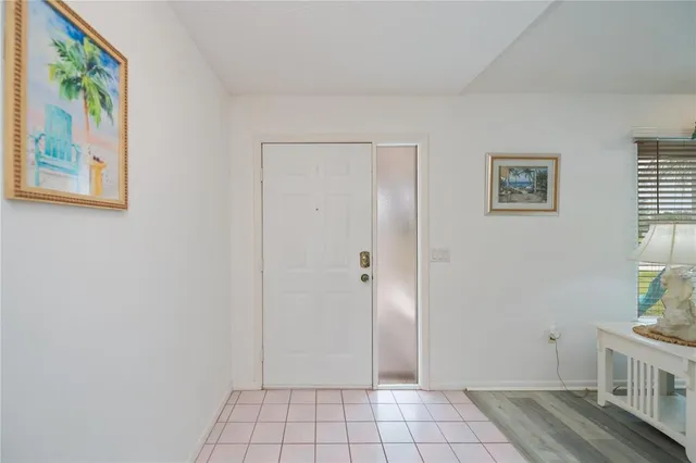 a kitchen with a stove sink and cabinets