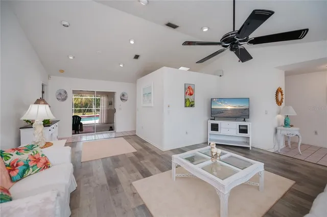a kitchen with a sink cabinets and window