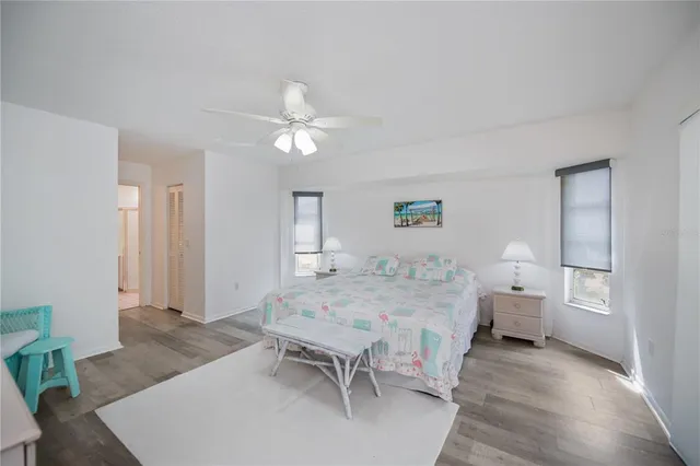 a bathroom with a double vanity sink mirror and toilet