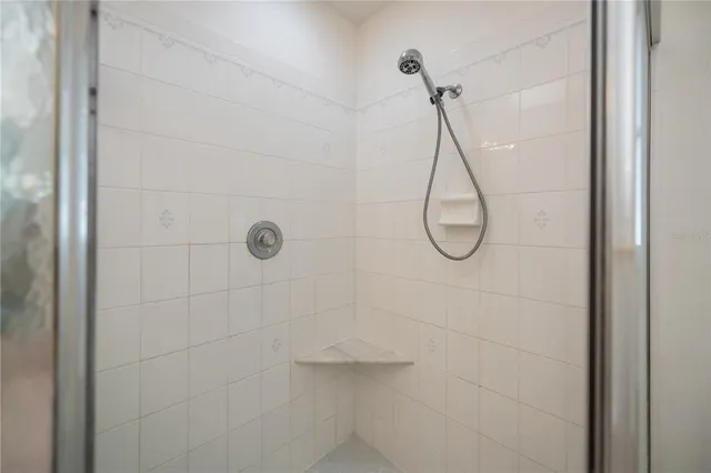 a view of a patio with a table and chairs