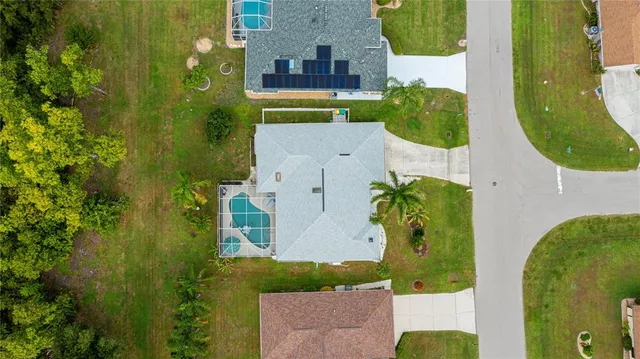 aerial view of a house with a swimming pool