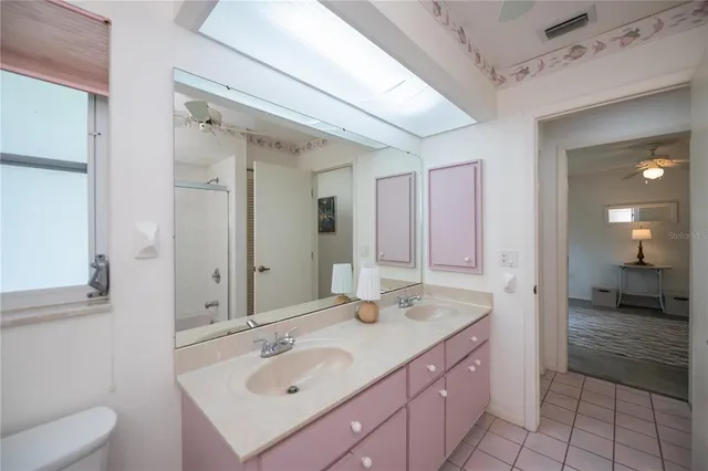 a view of a field with a tree