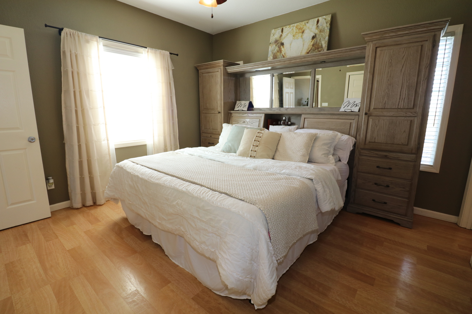 10942 Meridian Road Beason, IL 62512 - Photo 13 of 21 a large bed sitting in a bedroom next to a window