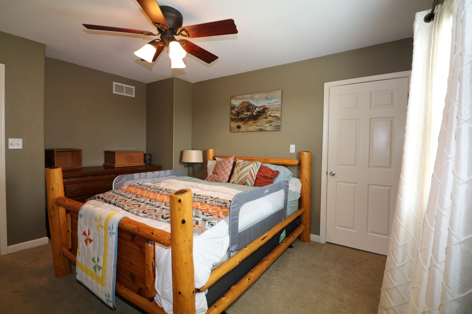 10942 Meridian Road Beason, IL 62512 - Photo 20 of 21 a bed sitting in a bedroom next to a window