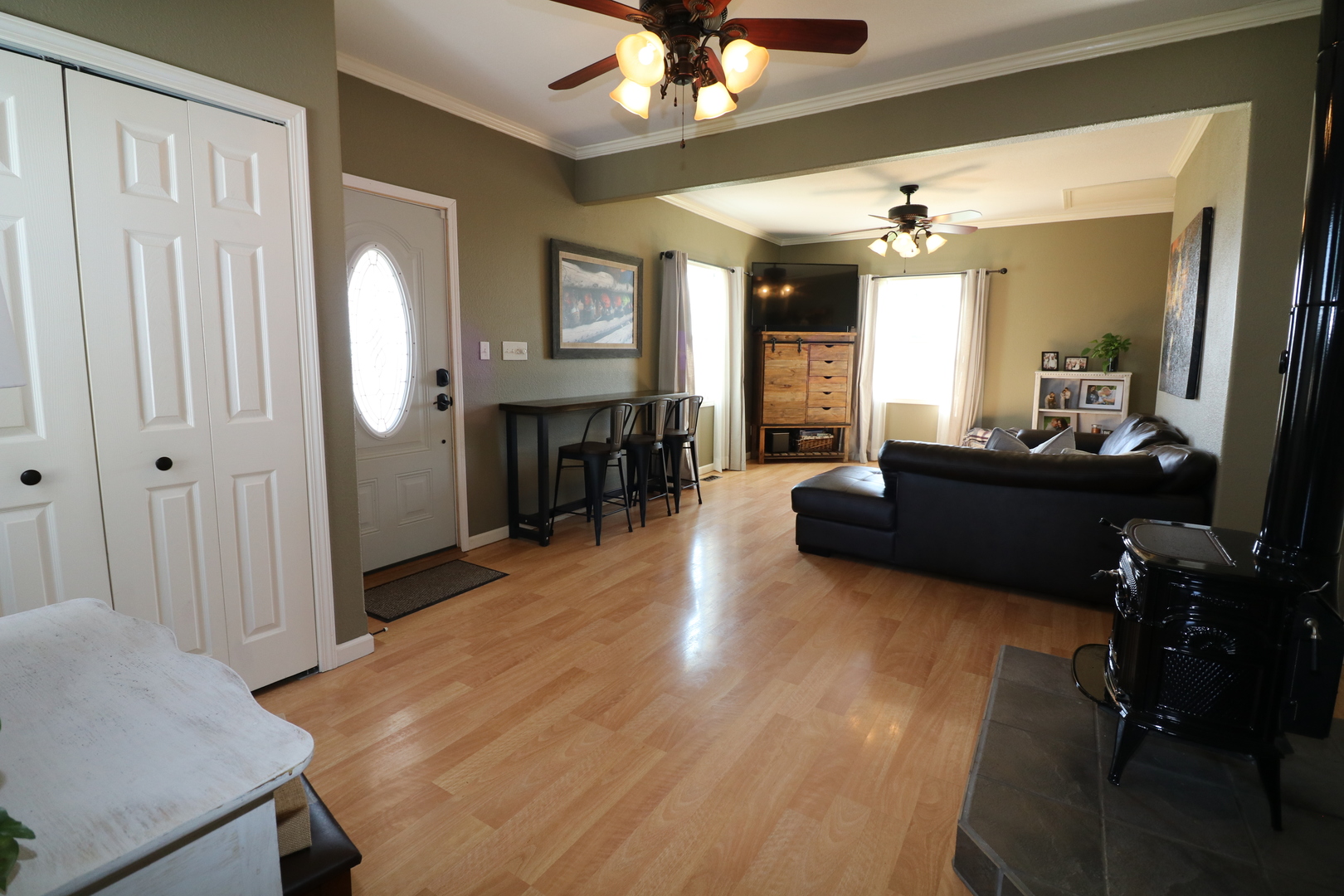 10942 Meridian Road Beason, IL 62512 - Photo 5 of 21 a living room with furniture and a chandelier